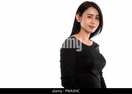 Studio shot of young happy Asian transgender woman smiling Stock Photo