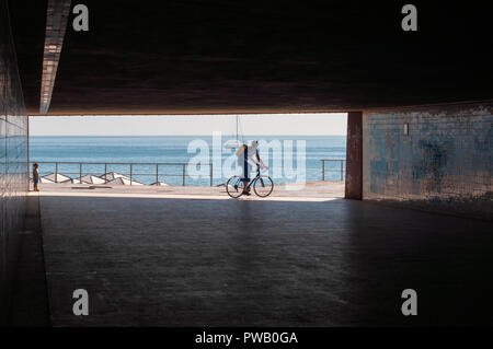 Underground passageway to the beach Stock Photo