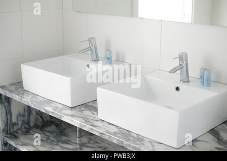 Bathroom with double his and hers basins