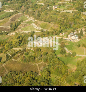 Les Granges organic vineyard (below centre) near Nus & Fenis as seen from above, Aosta Valley region NW Italy. Stock Photo