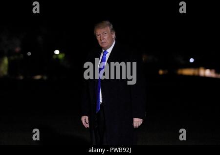 Washington, United States Of America. 13th Oct, 2018. United States President Donald J. Trump arrives back at the White House in Washington, DC, after a rally in Richmond, Kentucky on October 13, 2018. Credit: Olivier Douliery/Pool via CNP | usage worldwide Credit: dpa/Alamy Live News Stock Photo