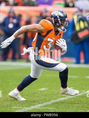 October 14, 2018: Denver Broncos running back Phillip Lindsay (30) with a  run during the first quarter of an NFL matchup between the Los Angeles Rams  and the Denver Broncos at Broncos