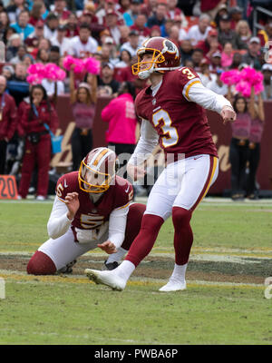 DEC 07, 2014 : Washington Redskins punter Tress Way (5) gets tackled after  a failed fake punt and run on fourth down during the matchup between the  St. Louis Rams and the