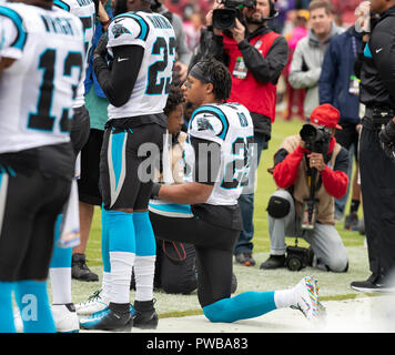 Landover, Maryland, USA. 14th Oct, 2018. Carolina Panthers strong safety Eric Reid (25) kneels as the National Anthem is played prior to the game against the Washington Redskins at FedEx Field in Landover, Maryland on October, 2018. Credit: Ron Sachs/CNP /MediaPunch Credit: MediaPunch Inc/Alamy Live News Stock Photo