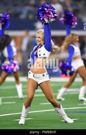 Arlington, Texas, USA. 14th Oct, 2018. The Dallas Cowboys cheerleaders perform during the first half of the NFL football game between the Jacksonville Jaguars and the Dallas Cowboys at AT&T Stadium in Arlington, Texas. Shane Roper/Cal Sport Media/Alamy Live News Stock Photo