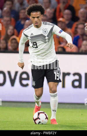 Leroy SANE (GER) with Ball, Single Action with Ball, Action, Full Character, Vertical, Soccer Laender, Nations League, Netherlands (NED) - Germany (GER) 3: 0, on Oct 13, 1818 at the Johan Cruyff Arena in Amsterdam/Netherlands. ¬ | usage worldwide Stock Photo