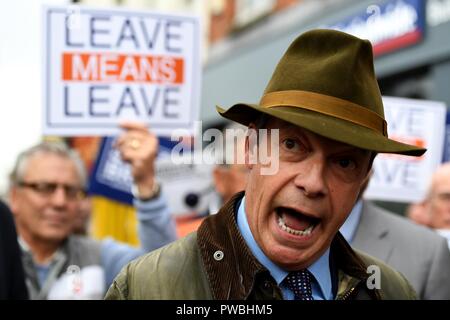 Bournemouth, UK. 15th Oct 2018. Nigel Farage MEP visits Bournemouth's Christchurch Market during the Leave Means Leave Brexit tour, UK Credit: Finnbarr Webster/Alamy Live News Stock Photo