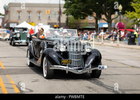 auburn duesenberg cord indiana driving september usa during classic street down car festival rain heavy th under