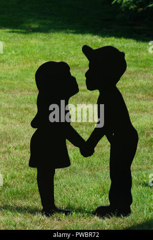 The Shadows Of A Boy And Girl Holding Hands On A Sunny Day Stock Photo Alamy