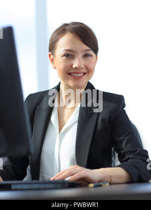 closeup. successful young business woman working on computer Stock Photo