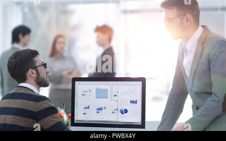 two businessmen analyzing stats financial data Stock Photo