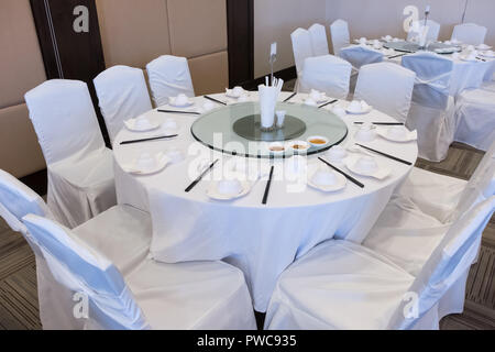 Chinese banquet set in the Thai restaurant for celebration time in the wedding ceremony. Stock Photo