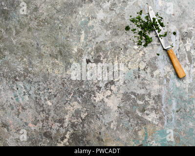 HyperFocal technique on paint splattered surface with knife Stock Photo