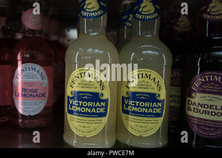 Fentimans Victorian Lemonade and dandelion and burdock also rose lemonade drink bottle on shelf in shop drinks famous tasty lemon thirst thirsty Stock Photo