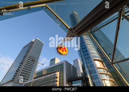 Warsaw, Poland - Oct 1, 2018: Office buildings and a metro station (Rondo 1)  in the downtown of Warsaw, Poland. Stock Photo