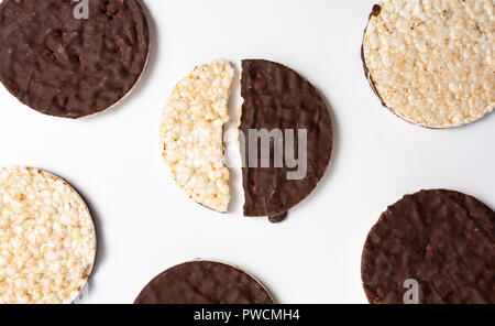 Chocolate covered corn plates snack dessert Stock Photo