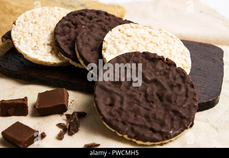 Chocolate covered corn plates snack dessert Stock Photo