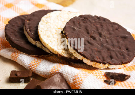 Chocolate covered corn plates snack dessert Stock Photo