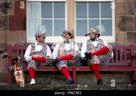 Golfers from Switzerland relaxing before taking part in the World Hickory Open Championships at Longniddry Golf Club on Scotland's Golf Coast, East Lothian. Stock Photo