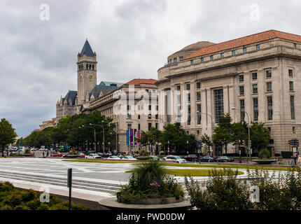 Washington DC, USA - October 12, 2017: Street view of the Old Post Office Pavilion building and clocktower and International Trade Centre building in  Stock Photo