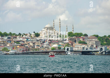 Suleymaniye mosque dominating the skyline of the Golden Horn with Galata bridge, the Bosphorus and ferries in foreground, Istanbul, Turkey Stock Photo