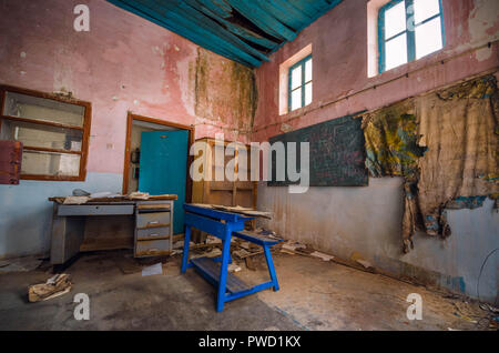 ruined classroom in an abandoned village in crete called kalami. Stock Photo