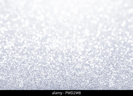 Glittering defocused silver background - Festive material Stock Photo