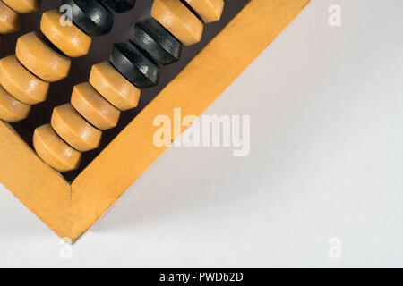 Wooden abacus on a white background. Stock Photo