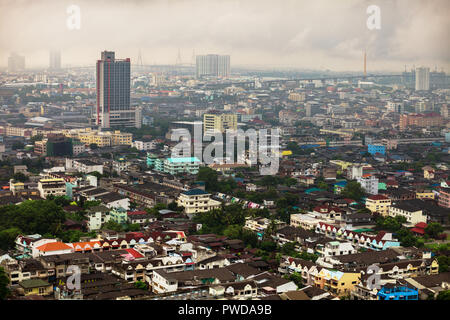 BANGKOK, THAILAND - Apr 12, 2013: On horizon in haze you can see city center, and in foreground suburbs Bangkok Stock Photo