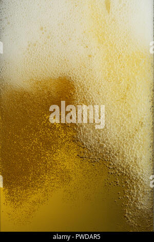Detail Texture of Foam Bubbles Light Blonde Beer, Ale, Light Beer, Cold, Chilled Stock Photo