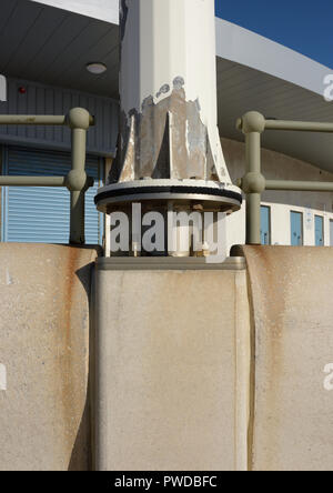 Stainless steel mounting plate fixed to concrete with stainless steel anchor bolts, supporting Vertical axis wind turbine in Cleveleys lancashire uk Stock Photo