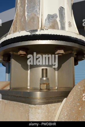 Stainless steel mounting plate fixed to concrete with stainless steel anchor bolts, supporting Vertical axis wind turbine in Cleveleys lancashire uk Stock Photo