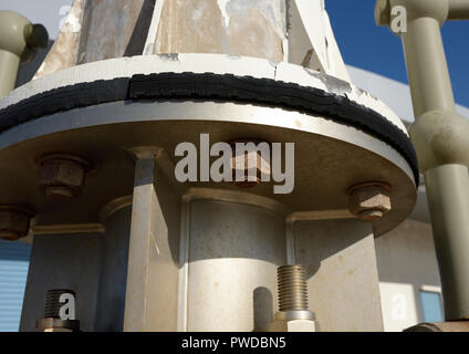 Fabricated and welded stainless steel wind turbine mounting fixed to  mast base in Cleveleys lancashire uk Stock Photo