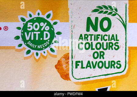 No artificial colours or flavours 50% vit D daily needs detail on box of Kellogg's Crunchy Nut cereals Stock Photo