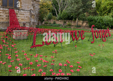 Weeping window display of handmade ceramic poppies for the centenary of WW1, the church of St Peter and St Paul's, Northampton, UK Stock Photo
