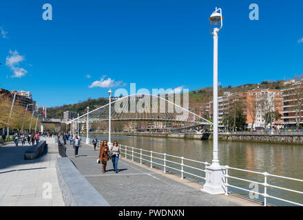 The Santiago Calatrava designed Zubizuri bridge over the Nervion River, Muelle de Urbitarte, Bilbao, Basque Country, Spain Stock Photo