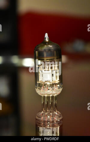 Tube for guitar amplifier ECC83 - 12AX7 type closeup. Vacuum electron tube. Stock Photo