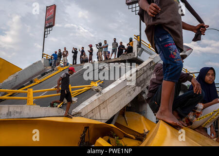 The Ponulele Bridge of Palu City which collapsed due to 