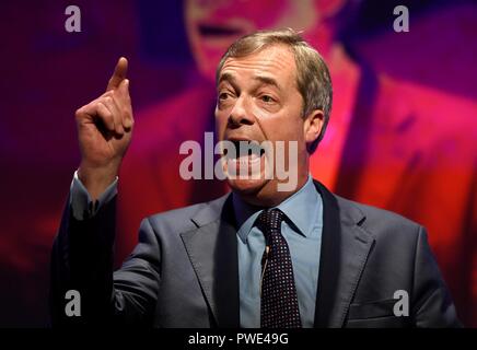 Bournemouth, UK. 15th Oct 2018. Nigel Farage MEP gives his speech at the Leave Means Leave rally to save Brexit at Bournemouth International Centre, (BIC), Dorset, UK Credit: Finnbarr Webster/Alamy Live News Stock Photo