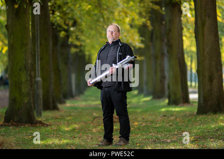 11 October 2018, Saxony-Anhalt, Magdeburg: Jörg Vollbrecht, expert for traffic safety, tree value determination and tree register of the company Klaus und Partner stands in the Rotehornpark with a drilling resistance meter in an avenue. (to "Increased tree mortality in Saxony-Anhalt feared after drought-summer" of 16.10.2018) Photo: Klaus-Dietmar Gabbert/dpa-Zentralbild/ZB Stock Photo