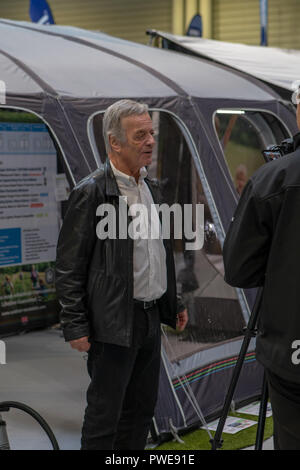 Birmingham UK 16 October 2018 Motorhome and Caravan Show at the NEC Birmingham UK. Popular Radio Tony Blackburn being interviewed Credit: Paul Hastie/Alamy Live News Stock Photo