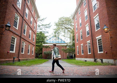 Boston, USA. 15th Oct, 2018. A student walks on the campus of the Harvard University in Cambridge of Massachusetts, the United States, on Oct. 15, 2018. A lawsuit charging Harvard University of discriminating against Asian American applicants in admissions went to trial on Monday at a U.S. District Court in Boston, drawing nationwide attention as the future of the affirmative action is also on the debate. Credit: Wang Ying/Xinhua/Alamy Live News Stock Photo