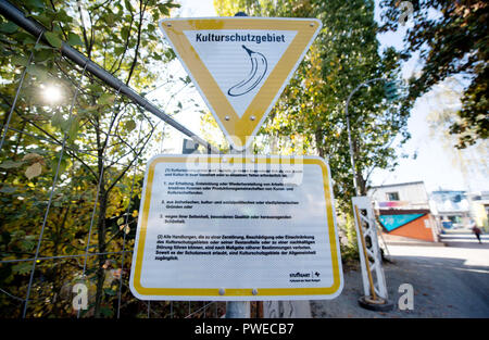 16 October 2018, Baden-Wuerttemberg, Stuttgart: 16 October 2018, Germany, Stuttgart: A sign with the inscription 'culture reserve' stands at the entrance of the 'Container-City' of the Kunstverein Wagenhalle e.V. on a site near the Nordbahnhof railway station. The award-winning Stuttgart Opera and Ballet will move near the Nordbahnhof station during the planned renovation of the Opera House. A task force of the city had located a suitable construction site at the wagon halls, which also included the area of the Container City. Photo: Marijan Murat/dpa Stock Photo