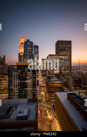 Minneapolis, Minnesota skyline at sunset as seen from the 26th floor of the 365 Nicollet apartment tower. Stock Photo