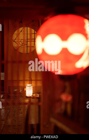 Red lantern of a traditional Japanese tea house, ochaya, at night in Gion, Higashiyama, Kyoto, Japan 2017. Stock Photo