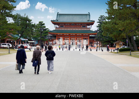 People walking towards Heian Shrine Outen-mon main entrance gate, Heian-jingu central Shinto shrine, Sakyo-ku, Kyoto, Japan 2017 Stock Photo