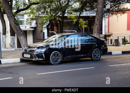 Novorossiysk, Russia - September 29, 2018: Car Toyota Camry parked at the edge of the roadway. Stock Photo