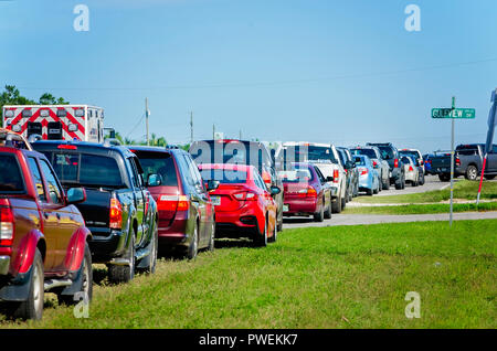 Cars line up outside Tom Thumb #155 gas station after Hurricane Michael, Oct. 12, 2018, in Panama City, Florida. Stock Photo