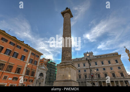 Marble Column of Marcus Aurelius in Piazza Colonna square in Rome, Italy. It is a Doric column about 100 feet high built in 2nd century AD and featuri Stock Photo