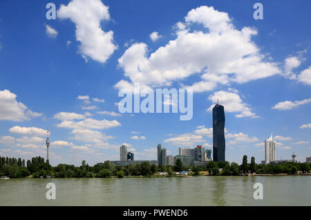 Austria, A-Vienna, Danube, Federal Capital, skyline of the Donau City, f.l.t.r. Danube Park with Donau Tower, Mischek Tower, residential tower, Saturn Tower, Commercial Tower, Ares Tower, Commercial Tower, UNO City with VIC Vienna International Centre and Austria Center Vienna, conference center, IZD Tower, Commercial Tower, DC Tower 1, Commercial Tower, skyscraper, highrise Neue Donau, apartment tower, river landscape, Danube landscape, Danube promenade, Danube bank, cumulus clouds Stock Photo